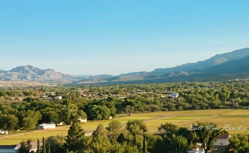 Aerial view of salt mine ranches showing mountains in background