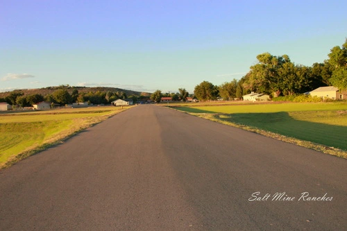 Ground view of salt mine ranches with paved road