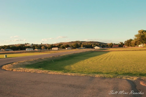 Ground view of salt mine ranches with paved road