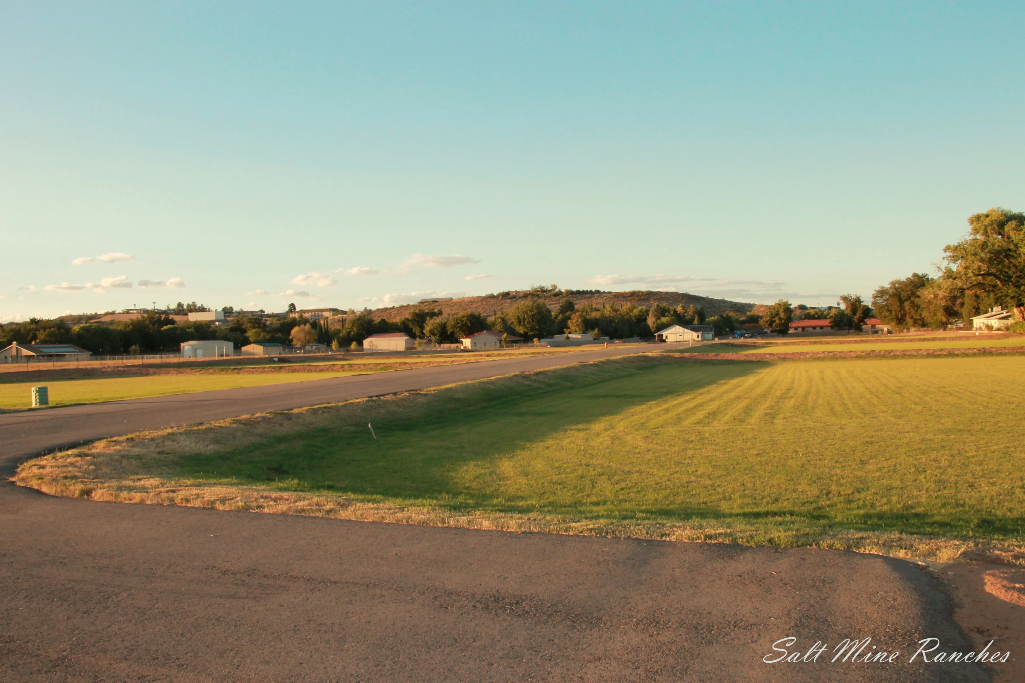 Ground view of saltmine ranches lot with paved road