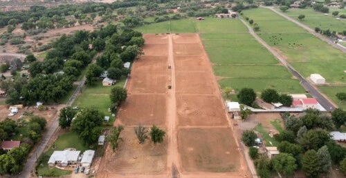 Aerial view of salt mine ranches with dirt lots leveled for building