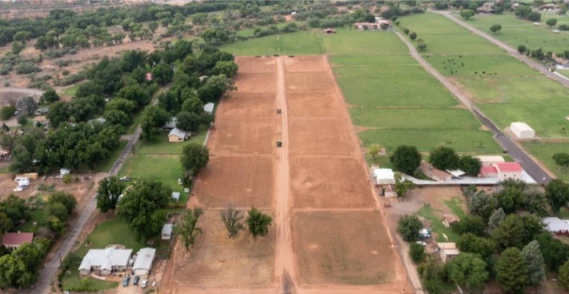 Aerial view of saltmine ranches with dirt lots leveled for building
